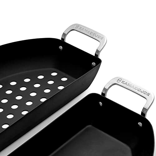 Close-up of two Kamado Joe grill pans, one with perforations.